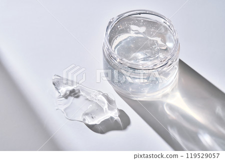 Texture of the gel in the jar. Hair gel or hyaluronic gel for the face. Texture of the gel in the jar. Hair gel or hyaluronic gel for the face. 119529057