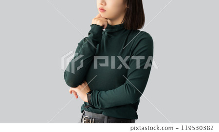 A young woman/businesswoman thinking 119530382