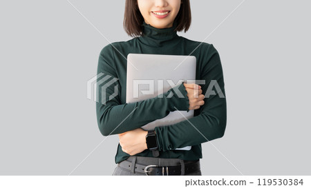 Smiling woman/businesswoman with a laptop 119530384