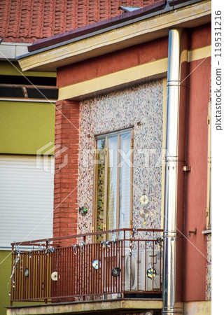 red brick building with windows 119531216