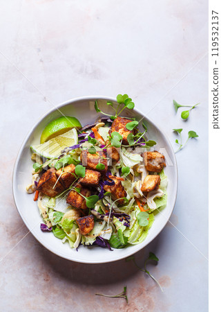 Crispy tofu salad with cashews and sprouts. Crispy tofu salad with cashews and sprouts. 119532137