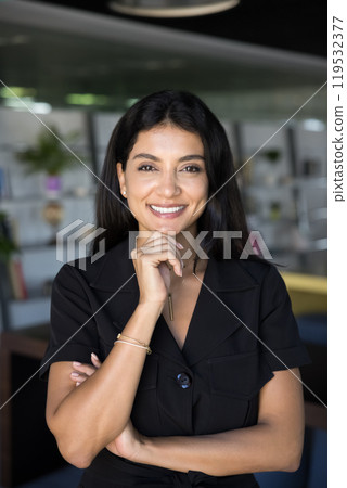 Happy beautiful young Middle Eastern businesswoman looking at camera 119532377