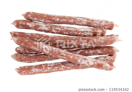 sticks of cured salami sausage isolated 119534102
