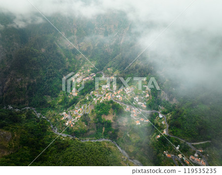 Aerial view of Curral das Freiras village. Miradouro da Eira do Serrado, Madeira, Portugal Aerial view of Curral das Freiras village. Miradouro da Eira do Serrado, Madeira, Portugal 119535235