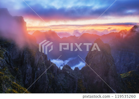 Mountains on sunset covered in fog and clouds. Madeira island, Portugal 119535260