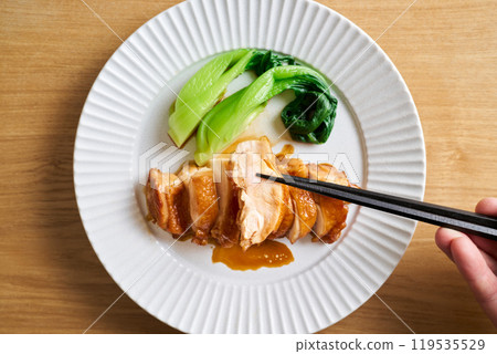 Chicken thighs simmered in soy sauce 119535529