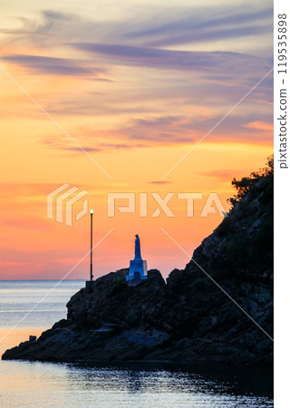 Statue of Mary on the sea at dusk in autumn, Amakusa City, Kumamoto Prefecture 119535898