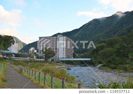 Tone River in early autumn, view near Minakami Water Travel Museum Tone River in early autumn, view near Minakami Water Travel Museum 119537711