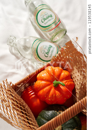 Autumn still life composition with pumpkin and soda bottle 119538145