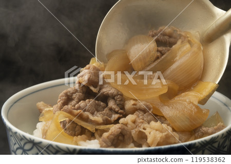 Gyudon: Place gyudon ingredients on rice 119538362