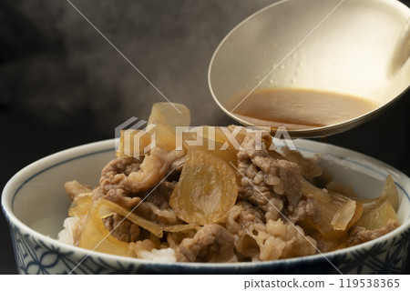 Gyudon: Place gyudon ingredients on rice Gyudon: Place gyudon ingredients on rice 119538365