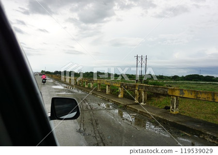 Philippine countryside view from a car Philippine countryside view from a car 119539029