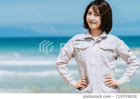 Young engineer standing on the beach 119539838