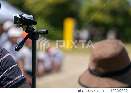 Video cameras are used to film the athletic meet. Video cameras are used to film the athletic meet. 119539892