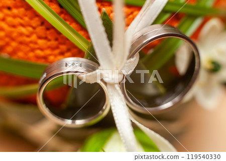 Exquisite and Beautiful Wedding Rings on an Elegantly Decorative Display for All to See 119540330