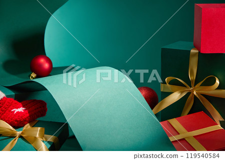 The Christmas-themed photo template, is decorated in detail with full-sized gift boxes, next to Christmas hanging balls and woolen stockings, along with curved paper to create a product display space. 119540584