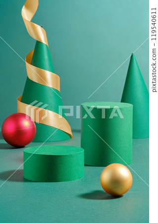 The circular pedestal that is left vacant for product display, positioned next to Christmas balls against a teal backdrop, a green cone podium, decorated with gold ribbon in the promotional image The circular pedestal that is left vacant for product display, positioned next to Christmas balls against a teal backdrop, a green cone podium, decorated with gold ribbon in the promotional image 119540611
