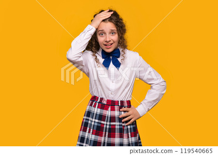Girl with hand on head, confused expression 119540665