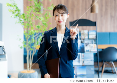 Consultant woman working at the reception desk 119541062