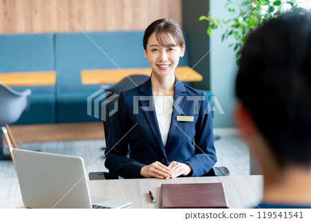 Female consultant at reception 119541541