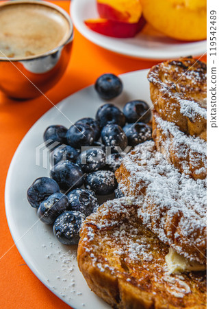 french toast on white plate for breakfast 119542489
