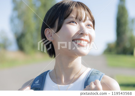 Young woman hiking 119543568