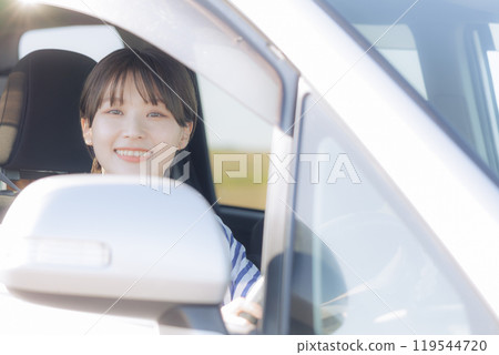 Young woman doing a drive Young woman doing a drive 119544720