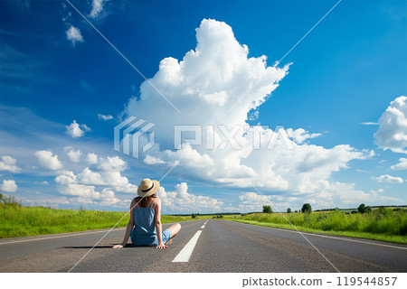 AI-generated image: A woman sitting on the road looking up at the blue sky 119544857