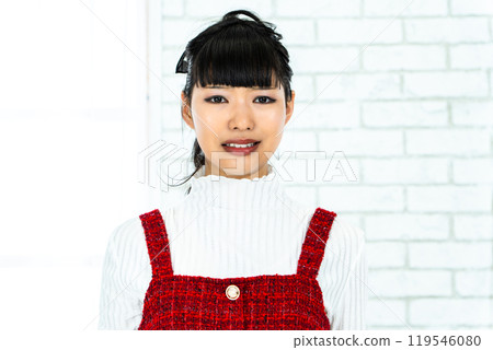 Woman making a disgusted face 119546080