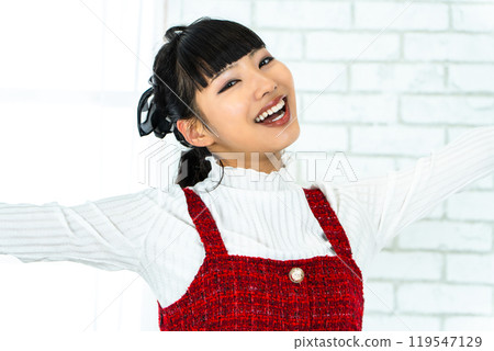 A woman rejoicing A woman rejoicing 119547129