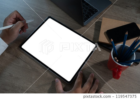 Digital tablet with blank screen for design mockup holding blank screen tablet Digital tablet with blank screen for design mockup holding blank screen tablet 119547375