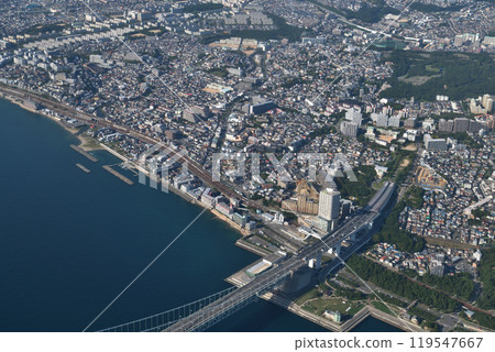 Aerial photo of the Akashi Kaikyo Bridge and Nishi-Maiko from the window of a passenger plane preparing to land at Kobe Airport on September 30th 119547667