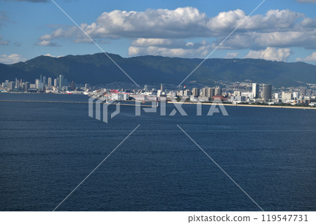 Aerial photo 29/30 View of Port Island from the window of a passenger plane preparing to land at Kobe Airport Aerial photo 29/30 View of Port Island from the window of a passenger plane preparing to land at Kobe Airport 119547731