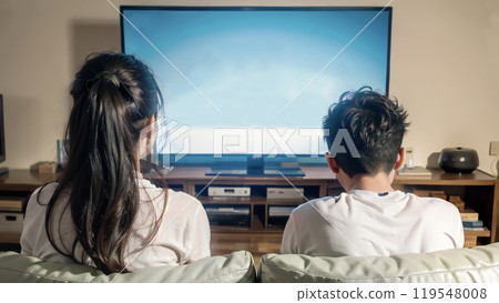 Back view of a couple watching a TV screen, generative AI_wide 119548008