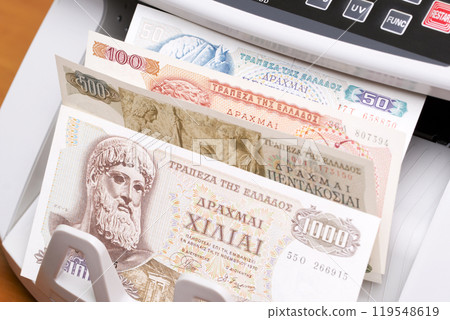 Greek drachma in the counting machine 119548619