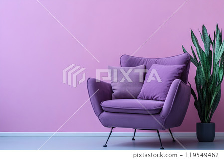Modern purple chair with cushions beside a tall plant against a pastel pink wall in a stylish 119549462