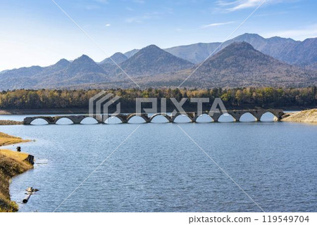 Taushubetsu River Bridge on the former Shihoro Line of the Japanese National Railways on a clear autumn day in Kamishihoro, Hokkaido Taushubetsu River Bridge on the former Shihoro Line of the Japanese National Railways on a clear autumn day in Kamishihoro, Hokkaido 119549704