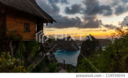 Experience the Serene Beachside Sunset while staying in an Elevated Cabin by the shore 119550034