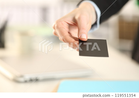 Business woman hand giving business card 119551354