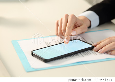 Executive hands signing digital contract on phone 119551545