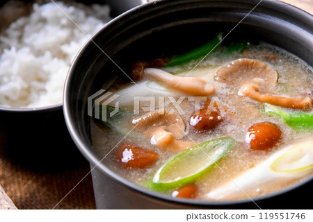 Eating mushroom soup at camp II Eating mushroom soup at camp II 119551746