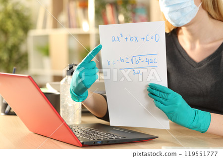 Teacher hands teaching online course on coronavirus confinement Teacher hands teaching online course on coronavirus confinement 119551777