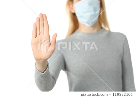Woman with mask doing stop sign isolated on white 119552105