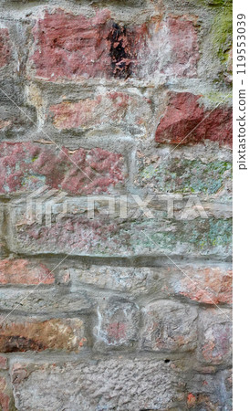 Textured Stone Wall With Various Colors and Patterns in Natural Light Textured Stone Wall With Various Colors and Patterns in Natural Light 119553039
