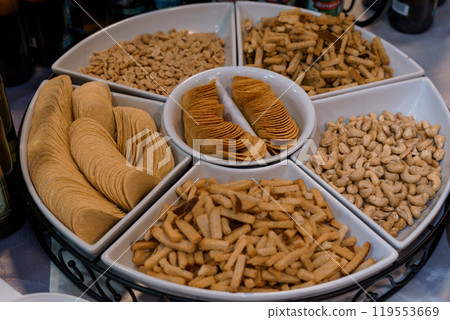 Variety of Snacks Displayed in a Decorative Platter 119553669