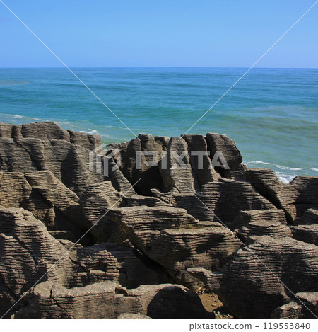Unique Pancake Rocks and turquoise sea in Punakaiki, New Zealand. 119553840