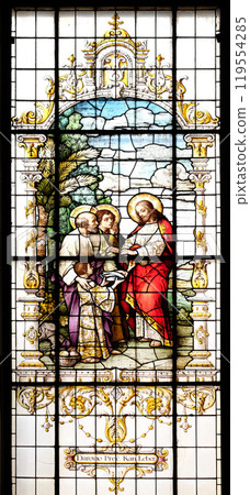 Multiplication of the Loaves and Fish, stained glass window in the Basilica of the Sacred Heart of Jesus in Zagreb, Croatia 119554285