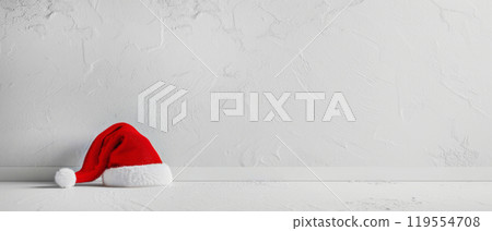 Santa Hat on White Background for Simple Holiday Design with Copy Space. Christmas Banner 119554708