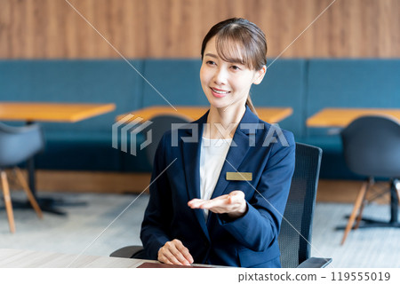 Female consultant at reception 119555019
