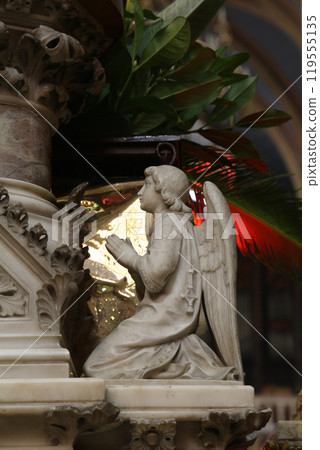 Angel, statue on the main altar in Zagreb cathedral Angel, statue on the main altar in Zagreb cathedral 119555135